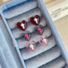 Wholesale Dark cross anti-allergic heart stud earrings