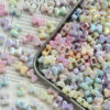 O1CN01SfVLSc2N5kr7Np0nv_2216430329912-0-cib Wholesale Four-way bow Acrylic Beads