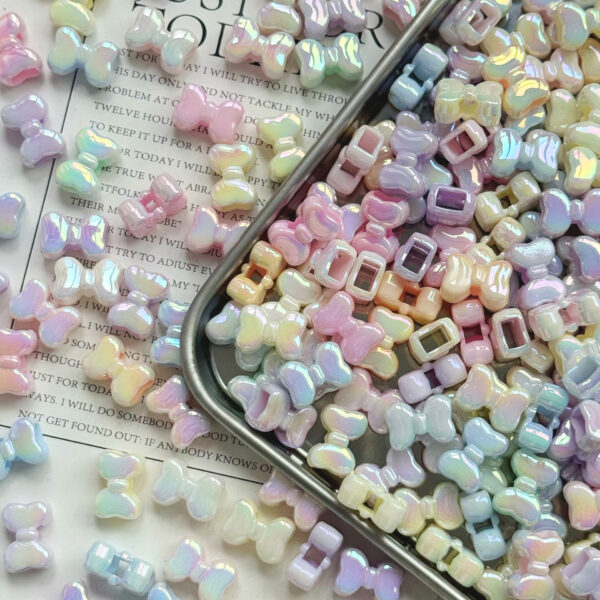 O1CN01SfVLSc2N5kr7Np0nv_2216430329912-0-cib Wholesale Four-way bow Acrylic Beads