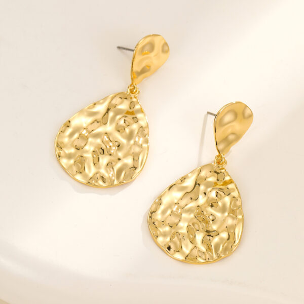 Wholesale Punch to create geometric texture earrings