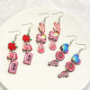 O1CN01T7KaME1ZtvJsrZYp6_3833523253-0-cib Wholesale Valentine's Day pink heart-shaped rose fringed earrings