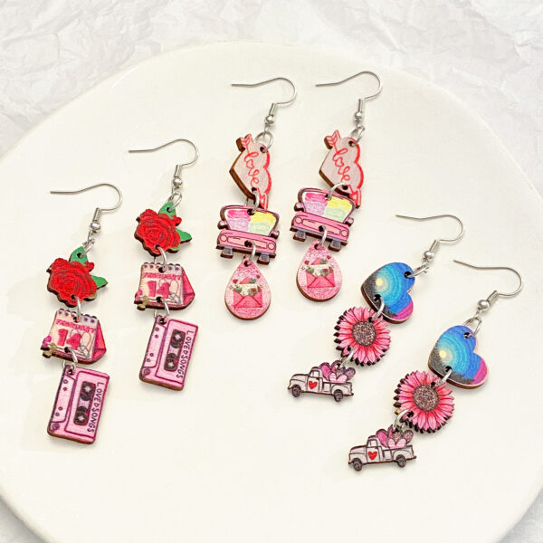 O1CN01T7KaME1ZtvJsrZYp6_3833523253-0-cib Wholesale Valentine's Day pink heart-shaped rose fringed earrings