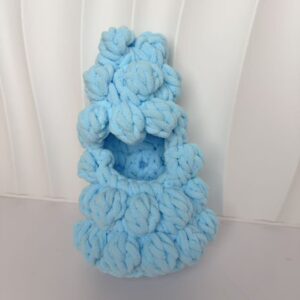 White embryo, light blue Christmas tree headgear