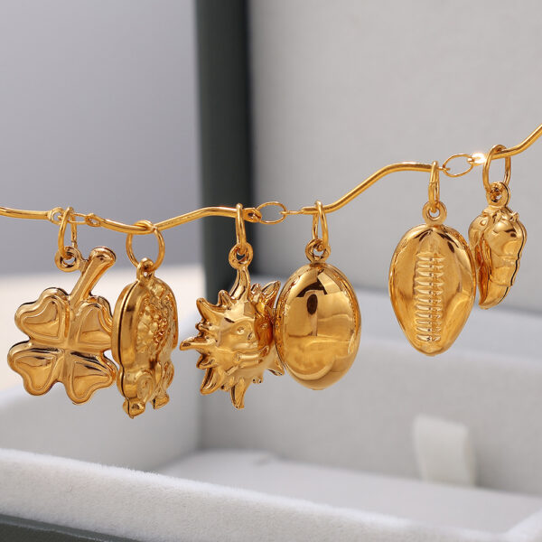 O1CN01T9RHaP1F2WygDtYvf_2216476030429-0-cib Wholesale Stainless Steel Sun Dolphin Pendant Necklace