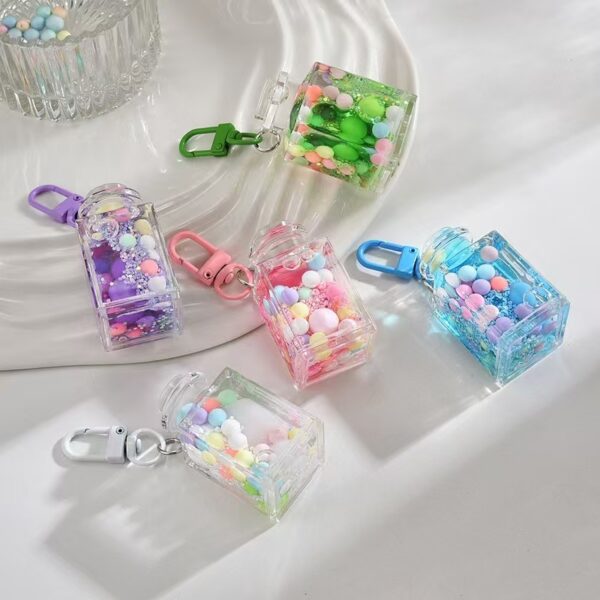 Wholesale Liquid sand bottle with colorful beads in oil bottle pendant acrylic keychain