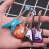 O1CN01TaSO3r1GRY0HJs1uJ_2211422200619-0-cib Wholesale doll house mini simulation electric guitar Doll Aessories