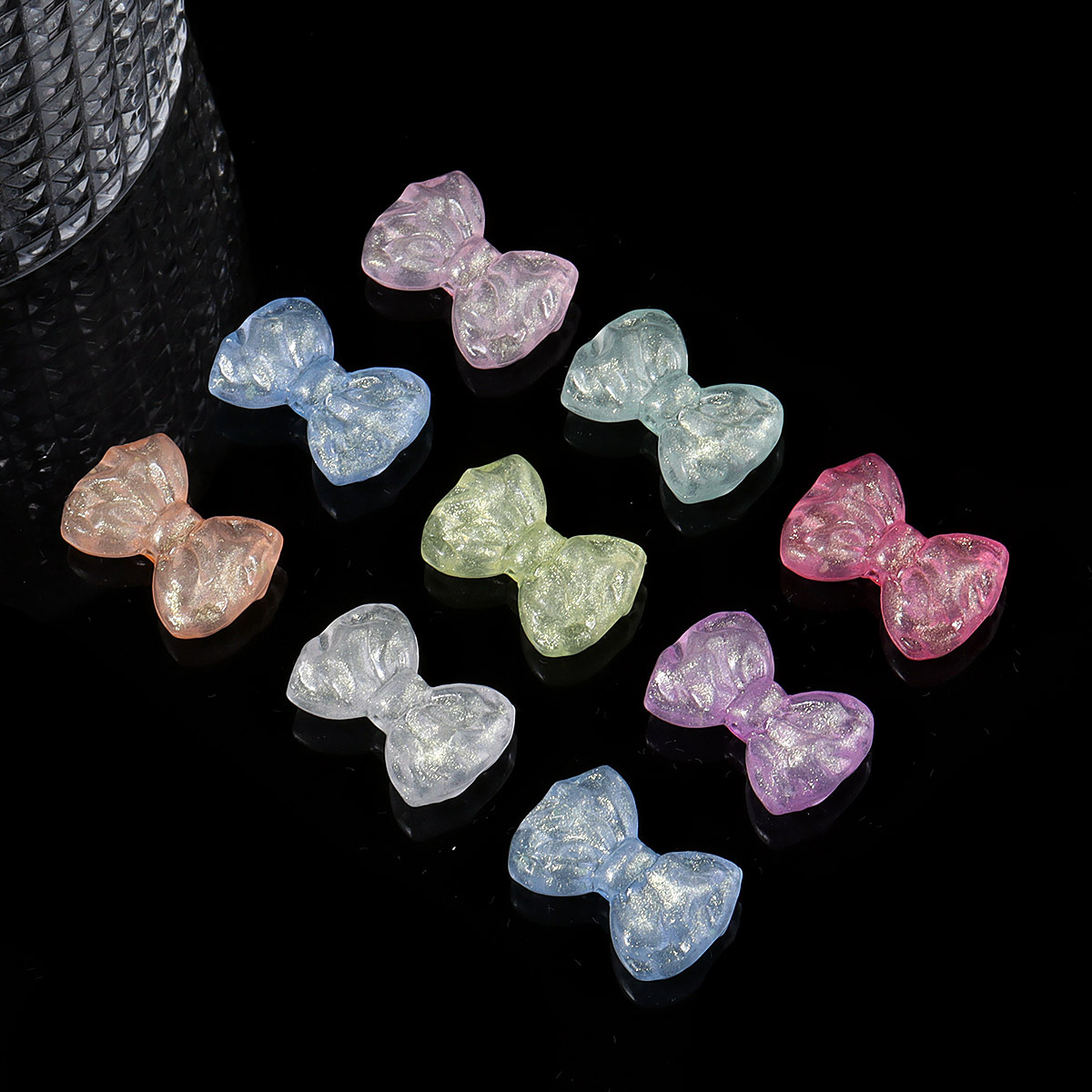 Wholesale luminous colored bow acrylic beads