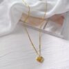 Wholesale Golden engraved love heart peach necklace