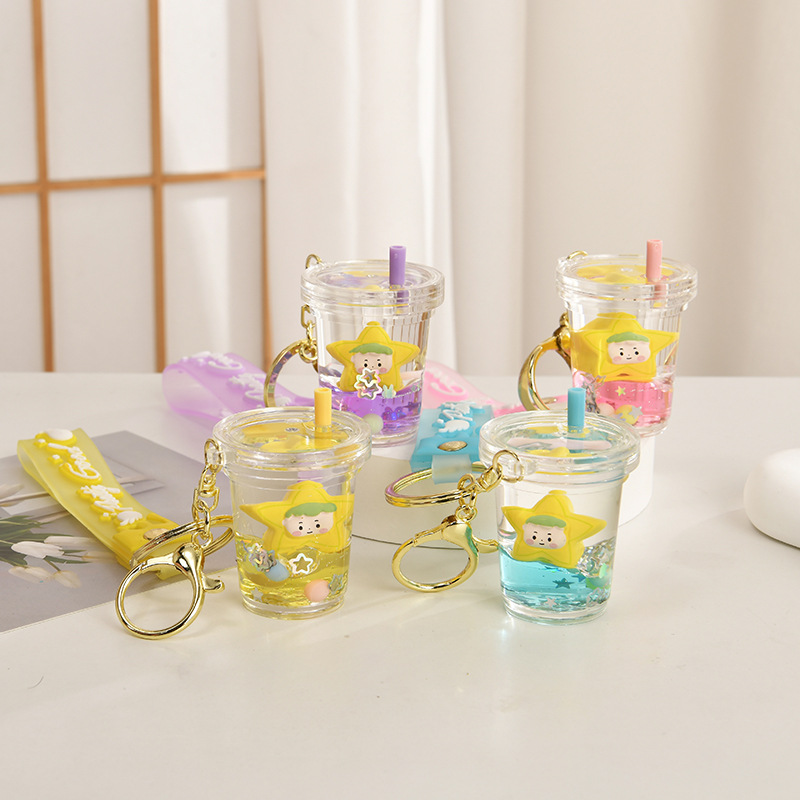 Wholesale Acrylic liquid sand bottle floating in oil keychain