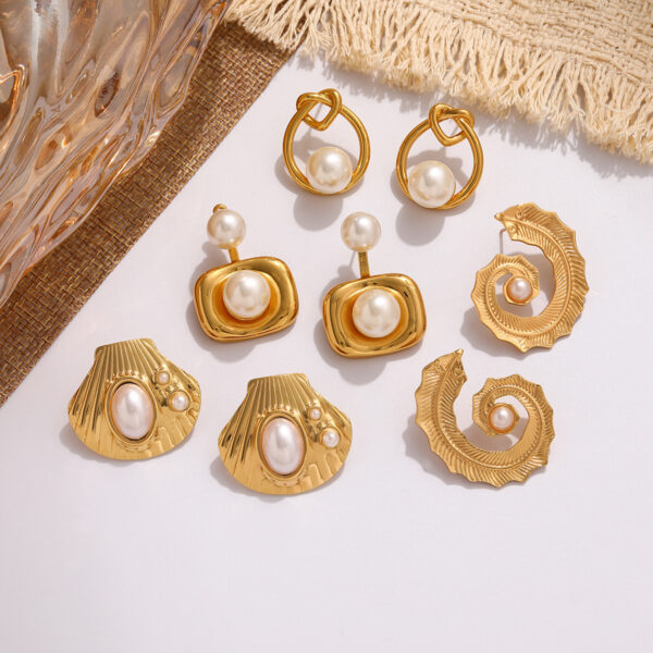 O1CN01UwiQIq1P9XFhlJS5c_2218506891798-0-cib Wholesale Cross-border titanium steel pearl stud earrings, light luxury, unique shell design, simple and versatile small women's earrings, wholesale available.