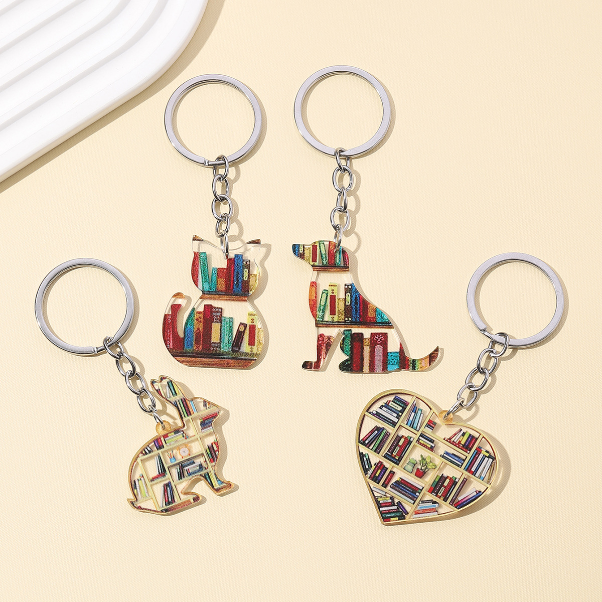 Wholesale Graduation season book cartoon dog cat rabbit love keychain