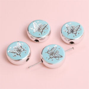 Flat disc-butterfly rose 18mm aperture about 2.5mm blue / 2/bag