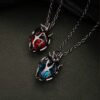 O1CN01V6L6hG1l7d8YdyB7S_2216037694772-0-cib Wholesale Gothic dark style hollow heart red blue glass heart pendant necklace
