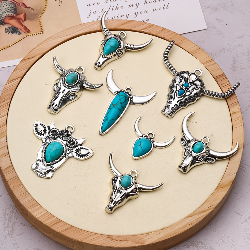 Wholesale Bohemian style turquoise diverse bull pendant