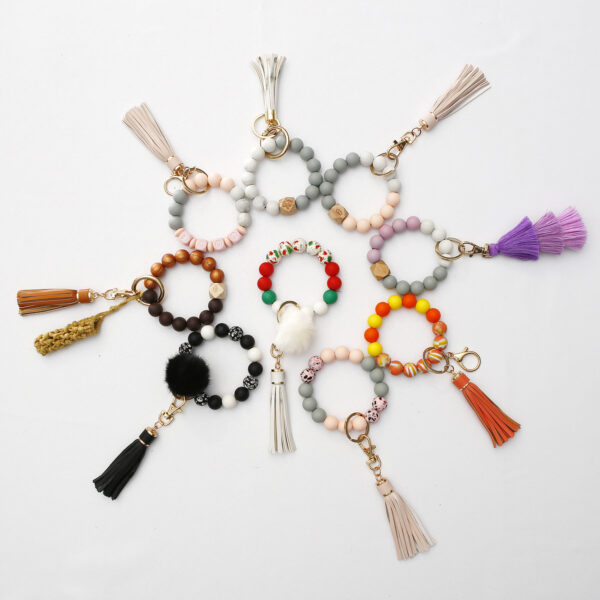 Wholesale Silicone Wrist Leather Tassel Bracelet Keychains