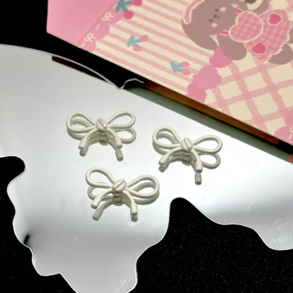 Wholesale Cute Ins Alloy Cut Out Rope Bow Separated Beads DIY