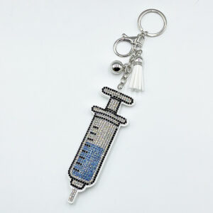 Wholesale Diamond-studded syringe keychain fashionable tassel pendant