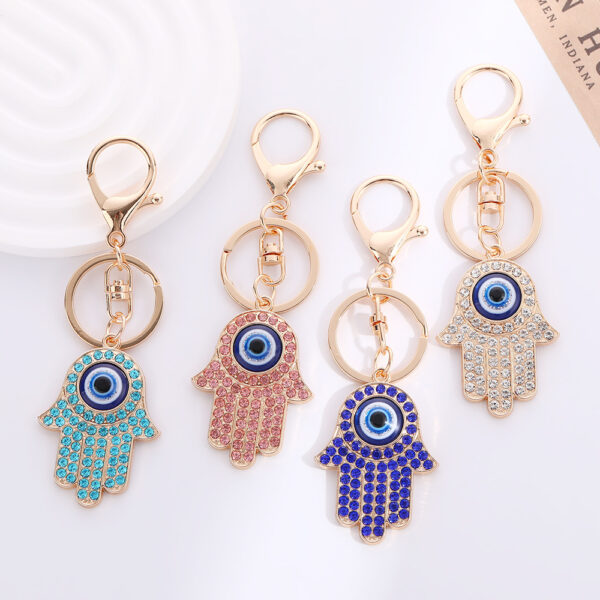 Wholesale Palm Devil's Eye with Water Diamond Metal Keychain