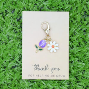 Purple keychain + cardboard