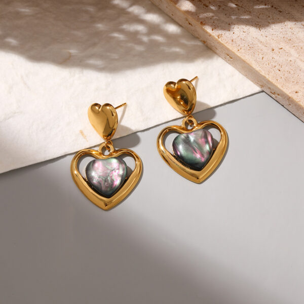 Wholesale Stainless steel heart earrings for women inlaid with cat's eye stone