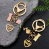 O1CN01XLuPTK2KpbgzKPJdH_2217654629606-0-cib Wholesale Valentine's Day Pink Love Heart Rose Keychain