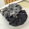 Wholesale Black polka dot bow with heart-shaped elastic headband