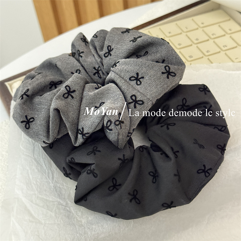 Wholesale Black lka dot bow with heart-shaped elastic headband