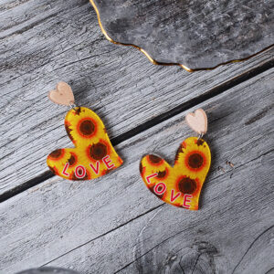 Pair of sunflower pattern earrings