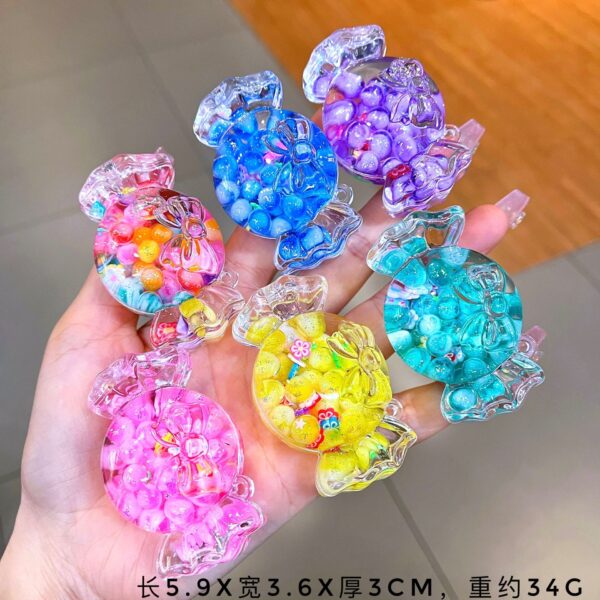 Wholesale Cute colorful candy-filled desktop ornament, quicksand bottle accessory, acrylic keychain, bag charm, small gift.