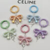 Wholesale Candy Color Bow Keychain Color Spring Buckle Cute Bag Pendant