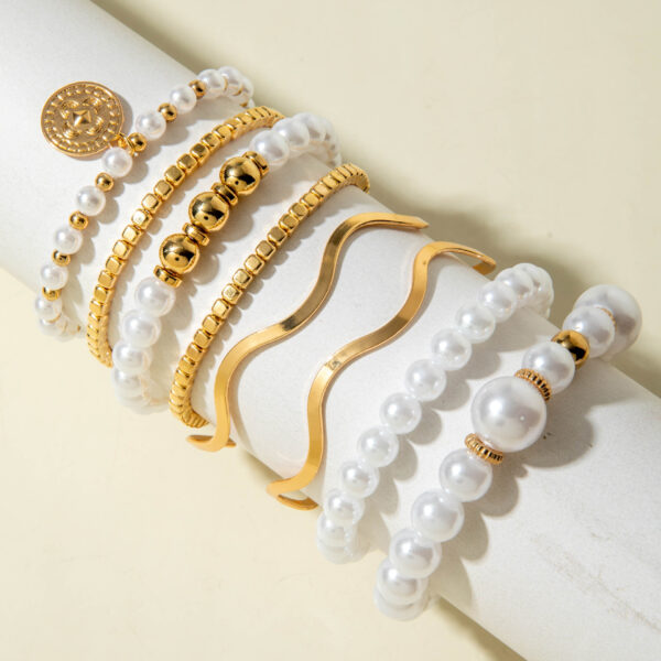 Wholesale Multi-layered Pearl Bracelet and Gold Bangle.