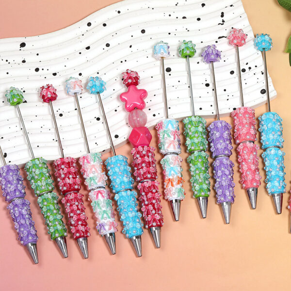O1CN01XoHM9J2DhdVOlixF2_2219481508641-0-cib Wholesale Clay ribbon butterfly beaded pen