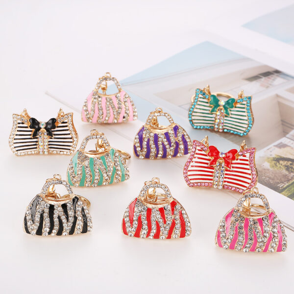 O1CN01Xvr41C27Kq2qccXPc_2218648477779-0-cib Wholesale Rhinestone Leopard Print Creative Bag Car Keychain