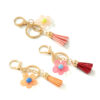 Wholesale Cute hollow sunflower tassel keychain