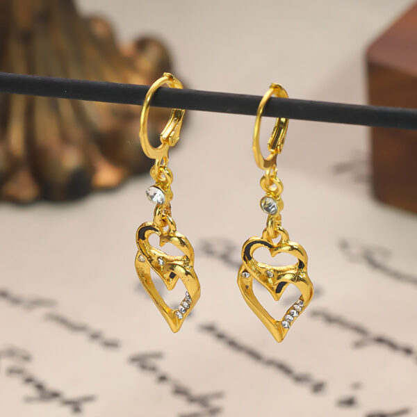 Wholesale Retro geometric hollow double heart tassel earrings