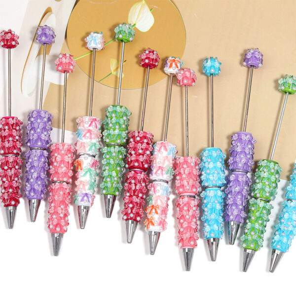 O1CN01YISF5W2DhdVJer7n8_2219481508641-0-cib Wholesale Clay ribbon butterfly beaded pen