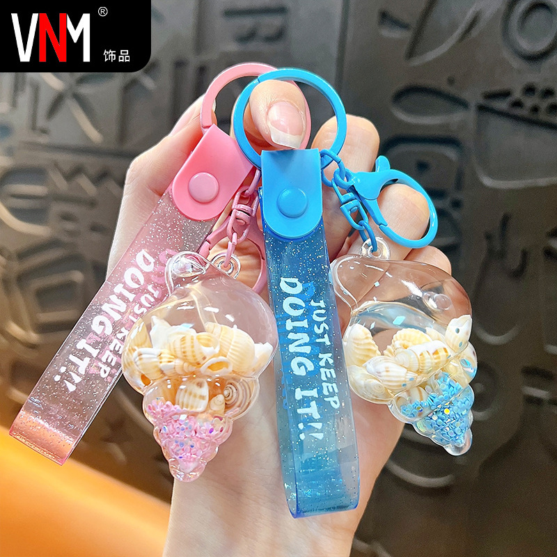 Wholesale Creative oil small conch keychain cute liquid quicksand aessories