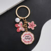 Wholesale Pink Butterfly Flowers Pearl HAPPYMOTHER'SDAY Keychain