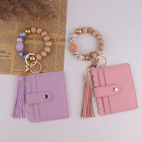 O1CN01YVPM9I1NrNvYRtKMt_2214899881623-0-cib Wholesale Silicone Handmade Beaded keychain