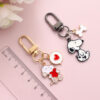 Wholesale Cute Cartoon Snoopy Metal Keychain Women's Exquisite Couple Gift Internet Popular Schoolbag Pendant Commemorative Accompanying Gift
