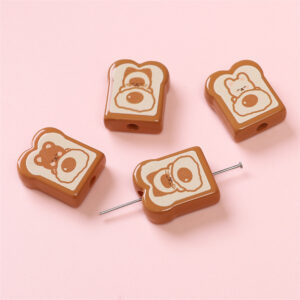 Animal toast piece 17x 21mm aperture about 3mm brown / 2/bag