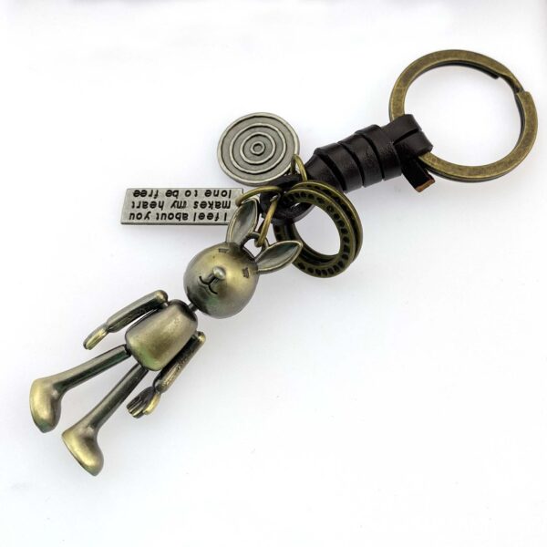 O1CN01YgFGnB1FKOLn9zb5t_2218365010468-0-cib Wholesale Vintage hand-woven movable rabbit cowhide keychain