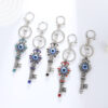 Wholesale Devil's Eye Key Shape with Water Diamond Metal Keychain