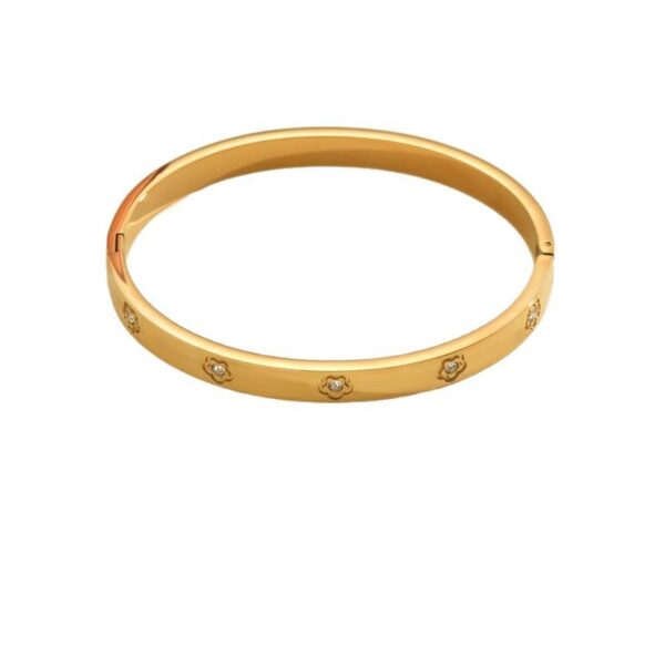 Wholesale Stainless steel four leaf clover inlaid with artificial zircon gold bracelet