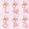 Wholesale Pink 26 letter Sparkling Pink Flower Tassel Keychain