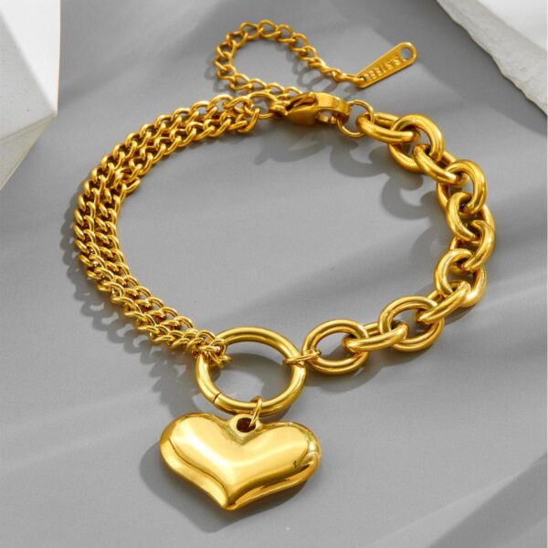 O1CN01ZTCQRh258LycPKiD0_2218546207481-0-cib Wholesale Retro Love Golden Titanium Steel Bracelet