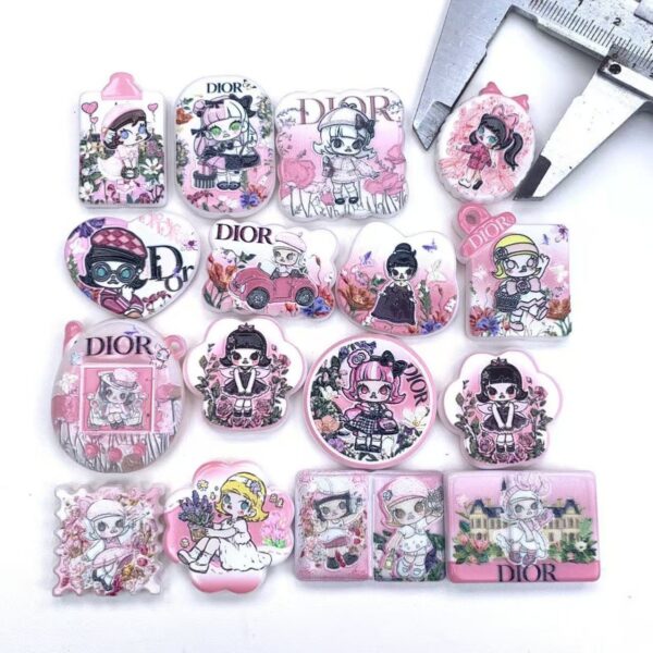 O1CN01Zi3lGd1l5L9HWq7ME_2221007554767-0-cib Wholesale style double-sided embossed printed beaded bag charms and aessories.