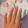 O1CN01ZieHJu2AcBbvTDqC0_2208092768223-0-cib Wholesale Pink gemstone heart set diamond ring