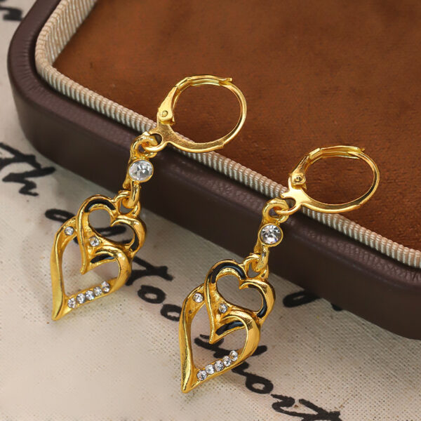 Wholesale Retro geometric hollow double heart tassel earrings