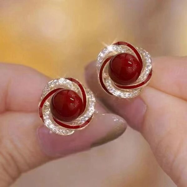 Wholesale Cinnabar red natural cat eye stone pearl earrings